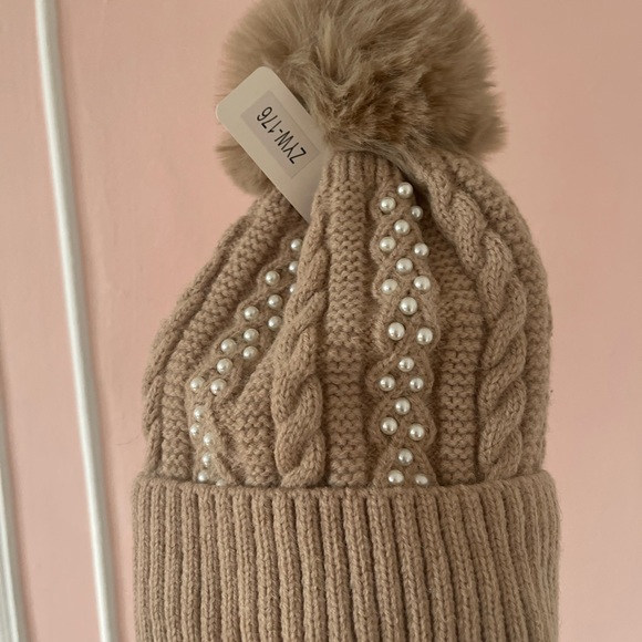 Light pink cozy fur lined winter hat with pompom and pearl bead design on front - Picture 2 of 4